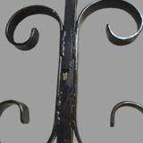 Pair of wrought iron candlesticks with cast bronze ball, 1970s.