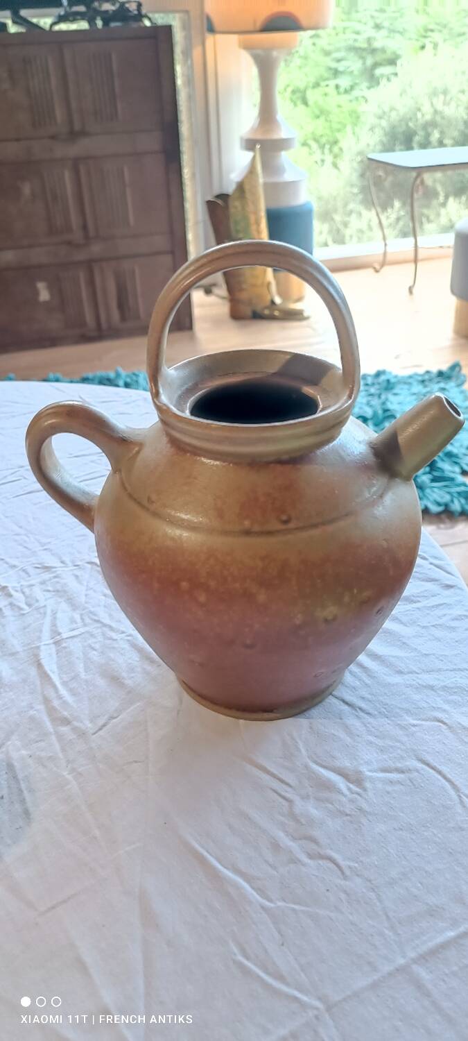 Iridescent carafe and 3 stoneware mazagrans from Digouin. Handmade work.