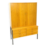 Armoire en placage Hellerau avec pieds et tiroirs en acier