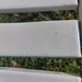 pair of white metal chairs, Tolix style