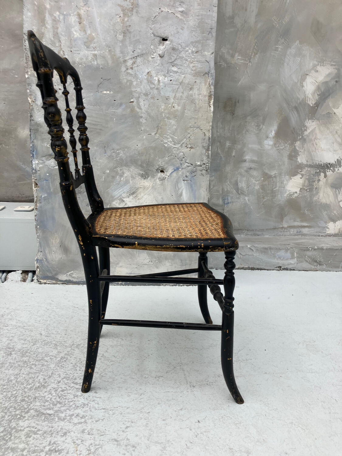 Napoleon III chair in blackened wood and cane