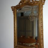 Miroir en bois stuqué doré XIXème siècle 92x142cm