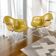 Paire de chaises coque LAR Eames pour Herman Miller avec des coussins en Naugahyde jaune.
