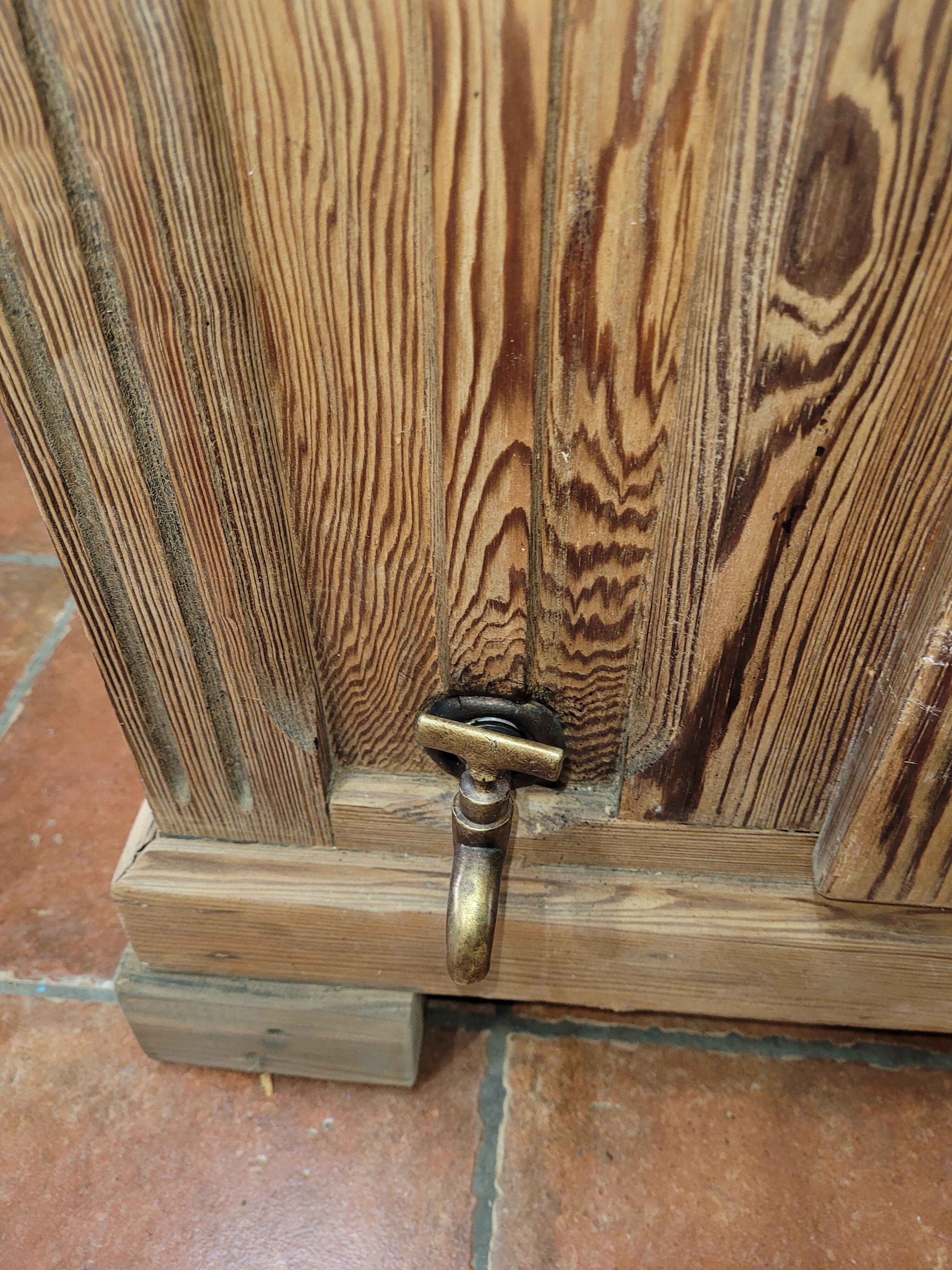 Antique cooler with a door