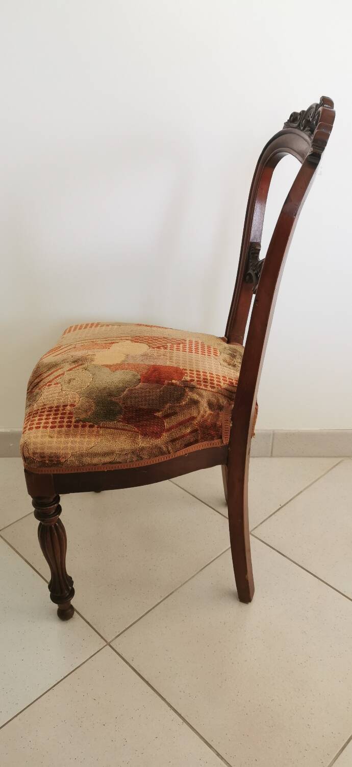 Carved wooden chair and velvet