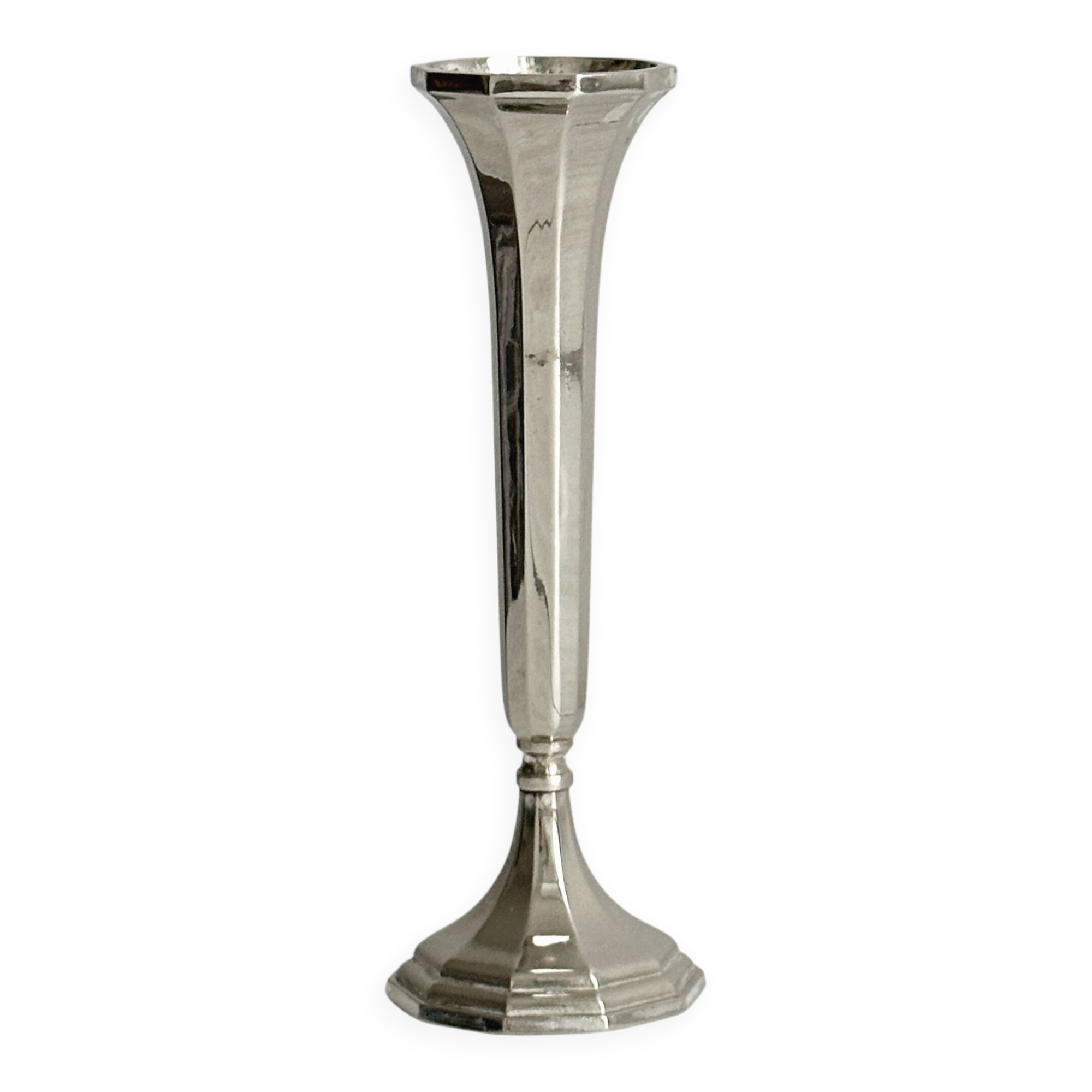 single flower vase or metal candlestick