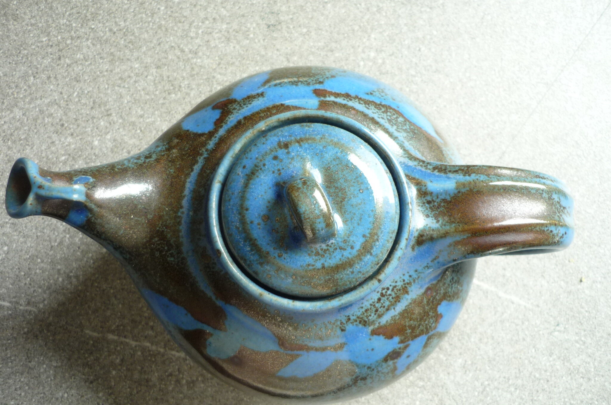 Vernified and flamed sandstone teapot, and its milk pot
