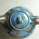 Vernified and flamed sandstone teapot, and its milk pot