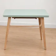 Small vintage children's desk attributed to Baumann – natural wood and lizard green top.