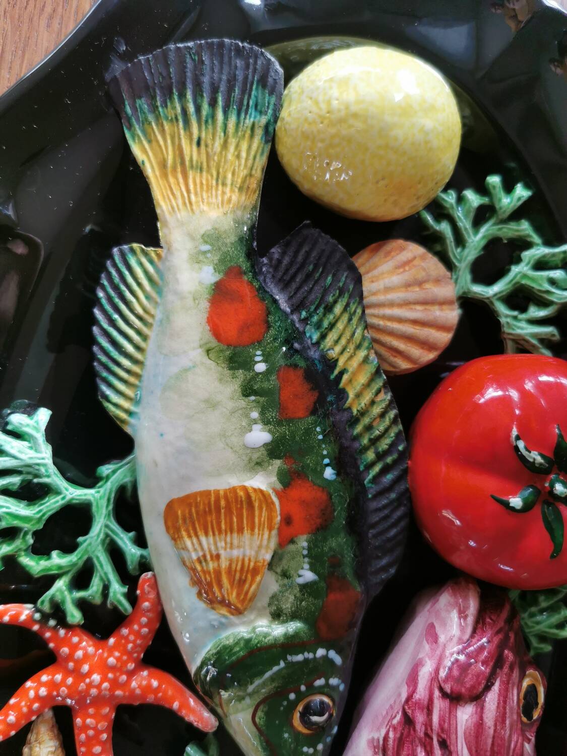 Vintage barbotine dish with fish decoration in relief