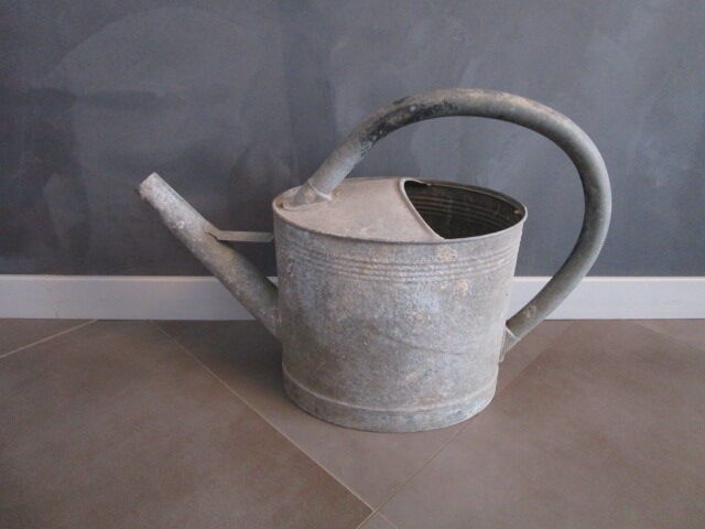 Old zinc watering can
