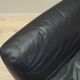Black leather pouffe/armchair, Italian design, 1960s, production: Italy