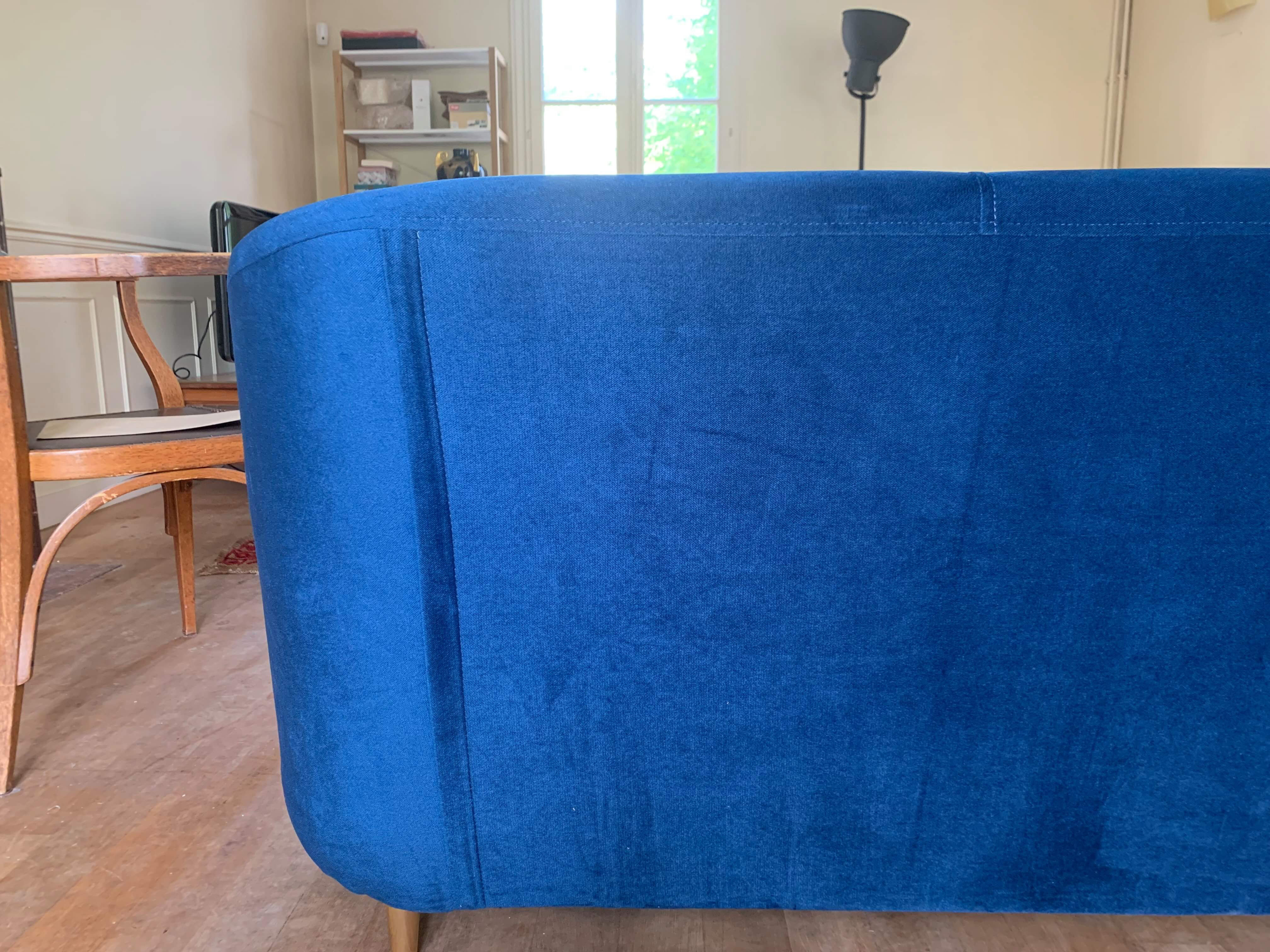 Blue velvet sofa