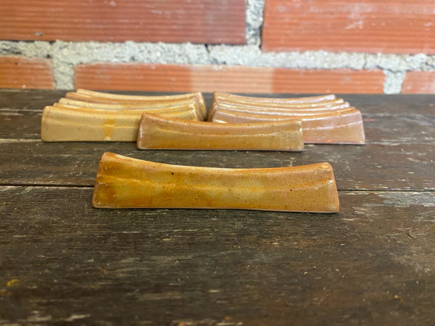 Set of 12 vintage stoneware knife rests