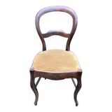 Old wooden chair with upholstered seat