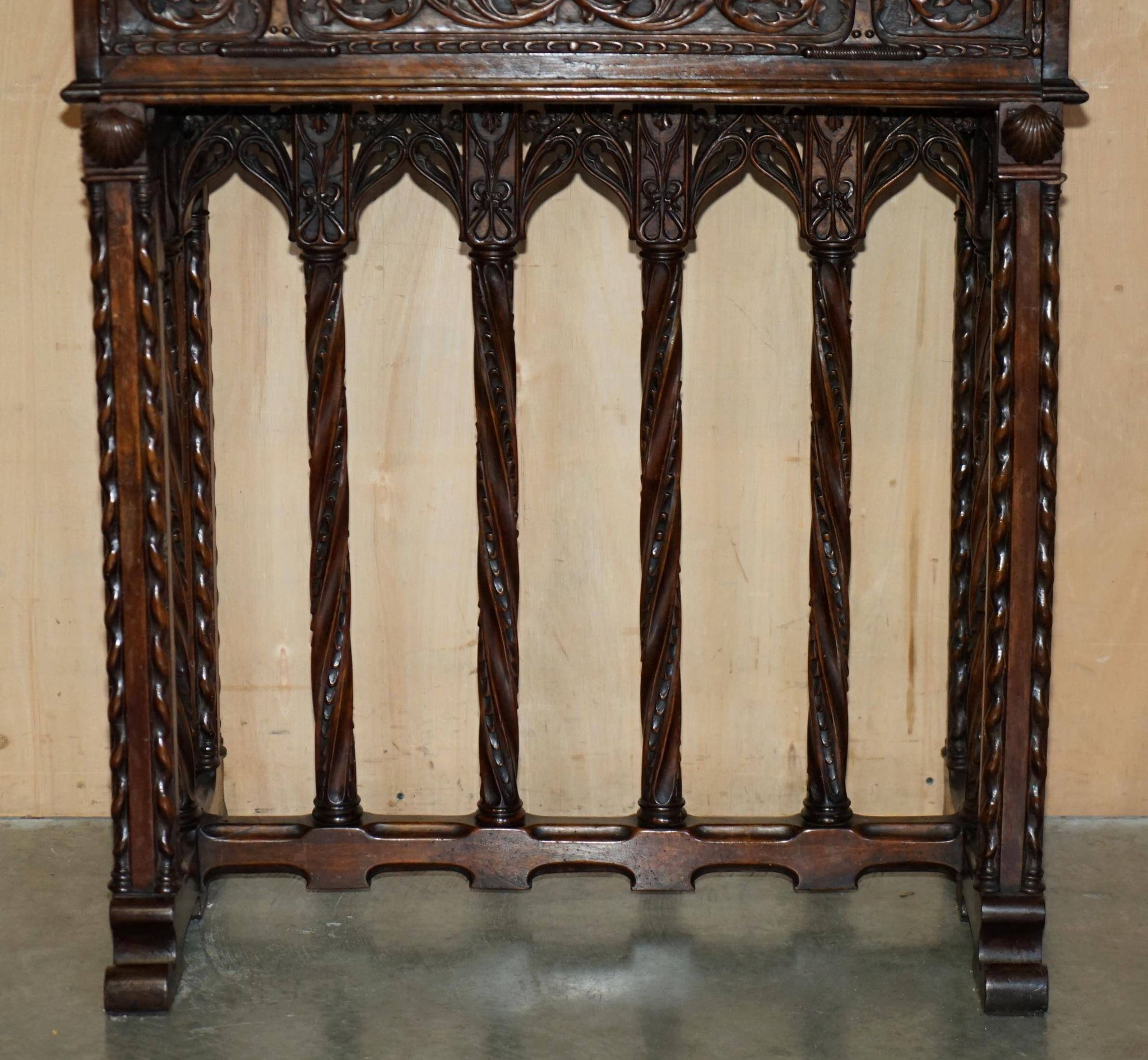 18th-century carved Spanish cabinet with hidden storage.