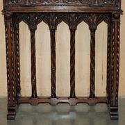 18th-century carved Spanish cabinet with hidden storage.