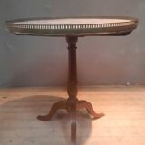 Gueridon circulaire dessu marbre blanc