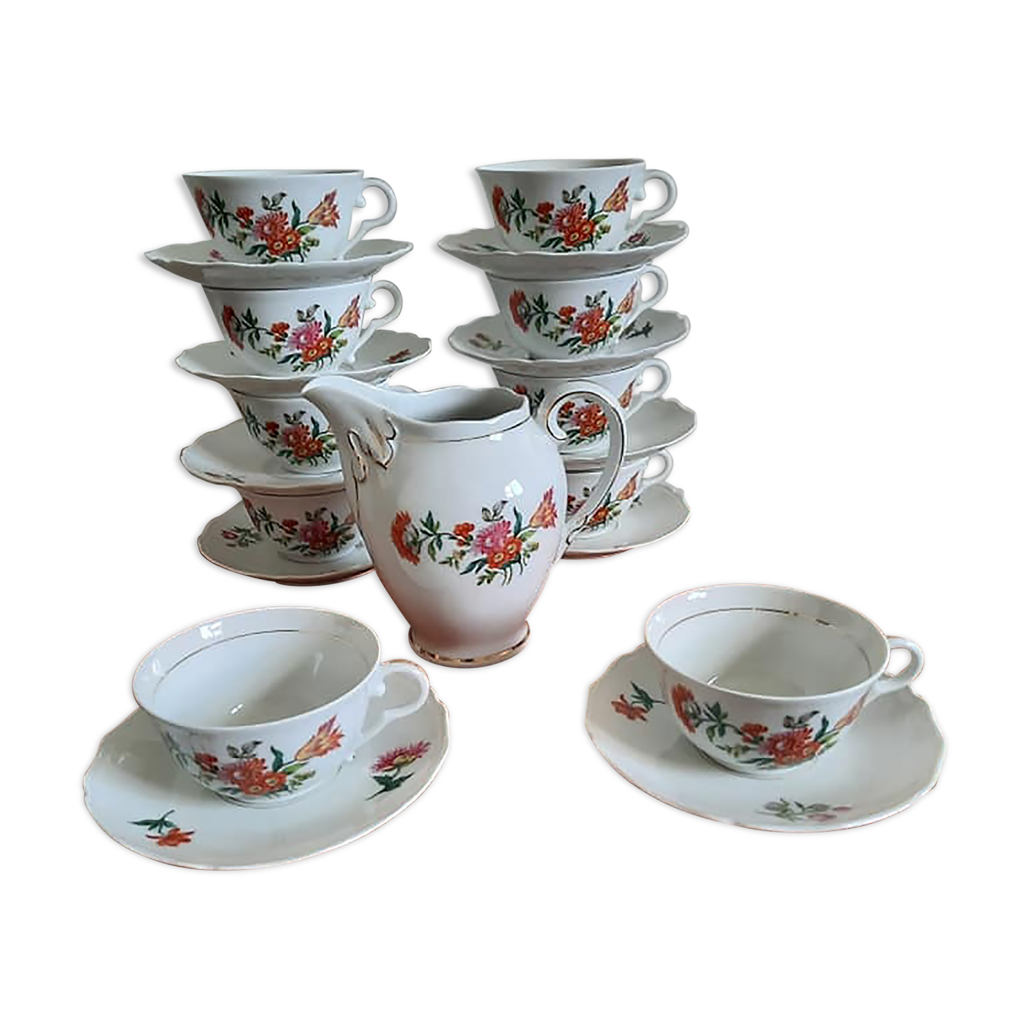 10 porcelain tea cups and 1 milk pot