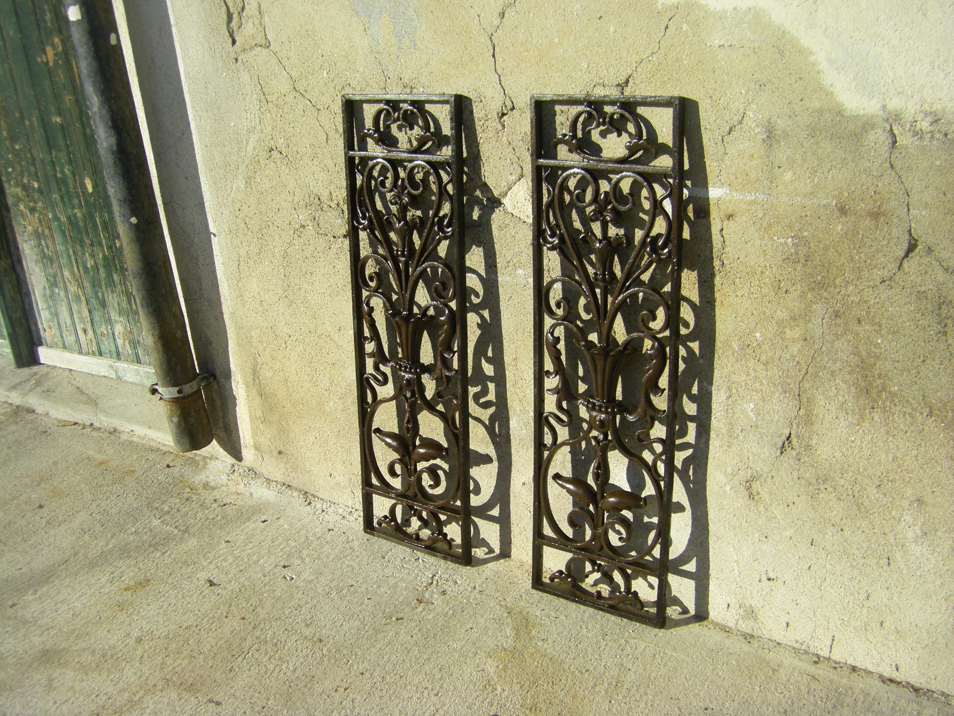 Pair of wrought iron door grilles from Dammarie