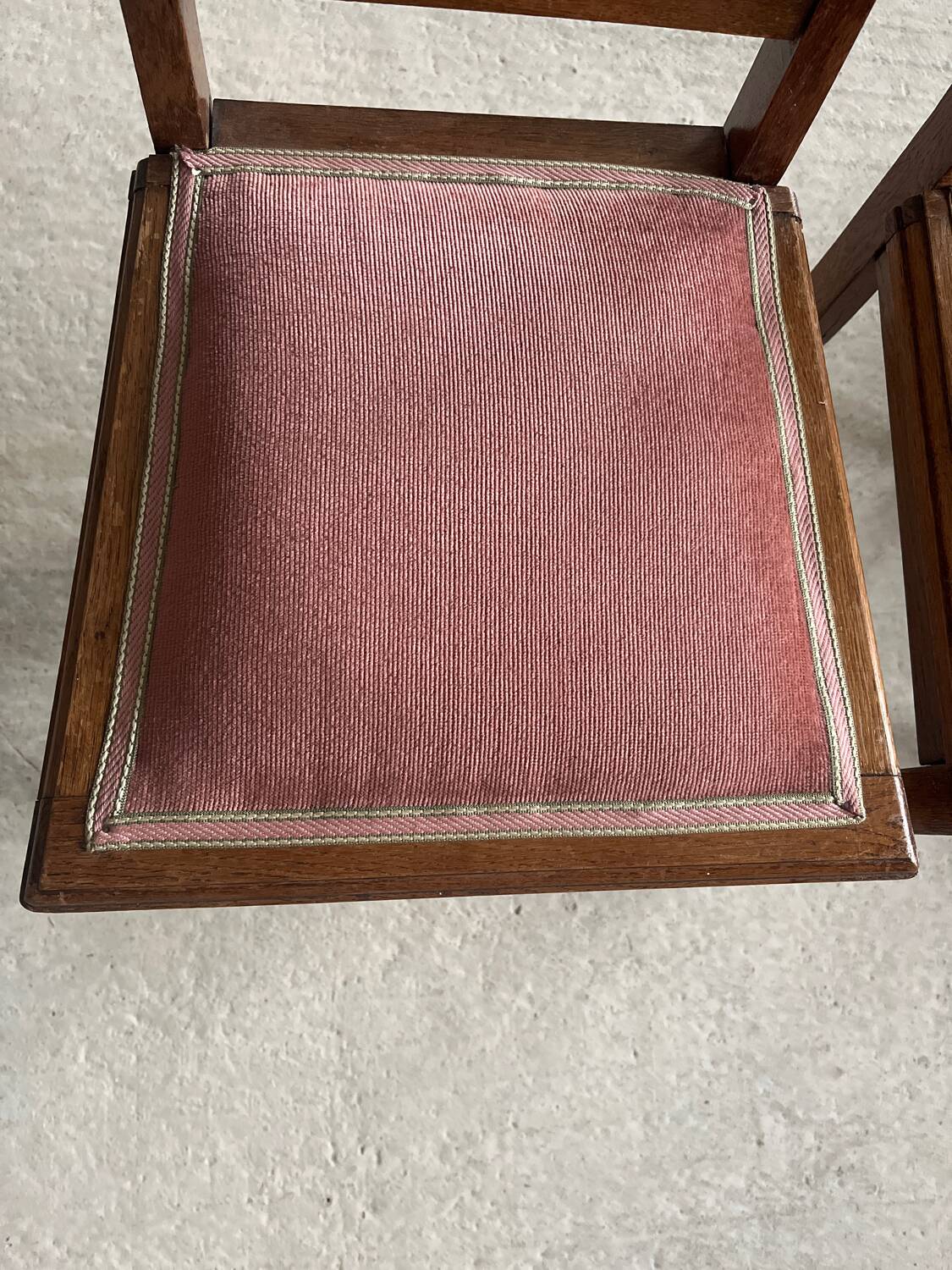 Pair of carved wooden chairs with pink velvet seat ART DECO