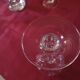Crystal wine glasses cut by Baccarat with a jug.