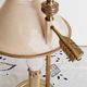 Gilded bronze hot water bottle lamp, Empire style, beige metal lampshade