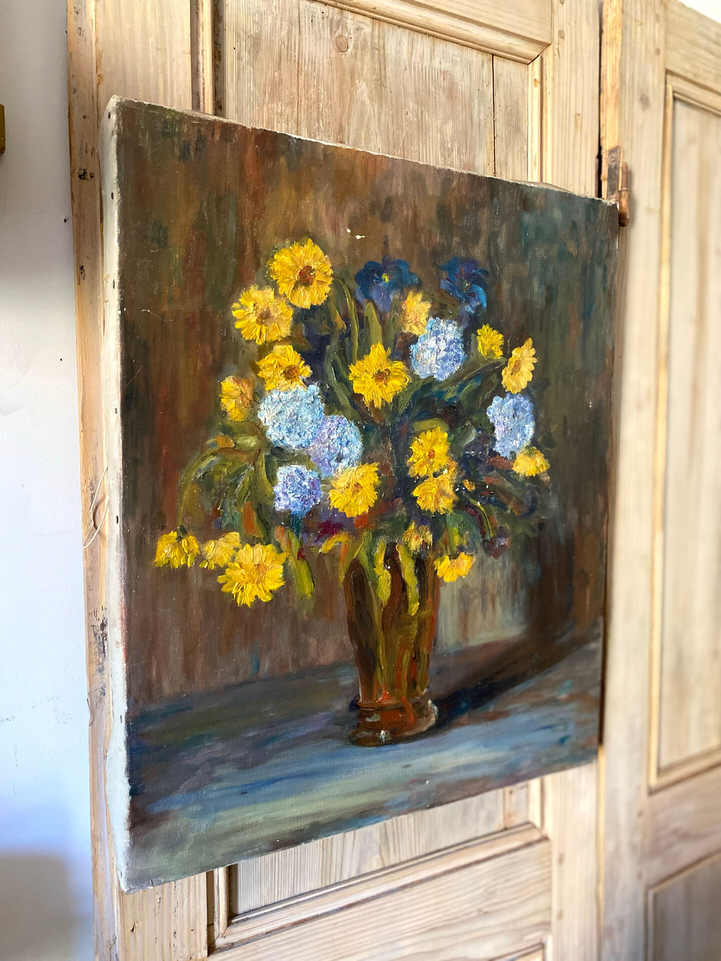 Oil on canvas, bouquet of yellow and blue flowers, mid-20th century.