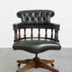 Green leather height-adjustable, swivel and tilt chesterfield office chair