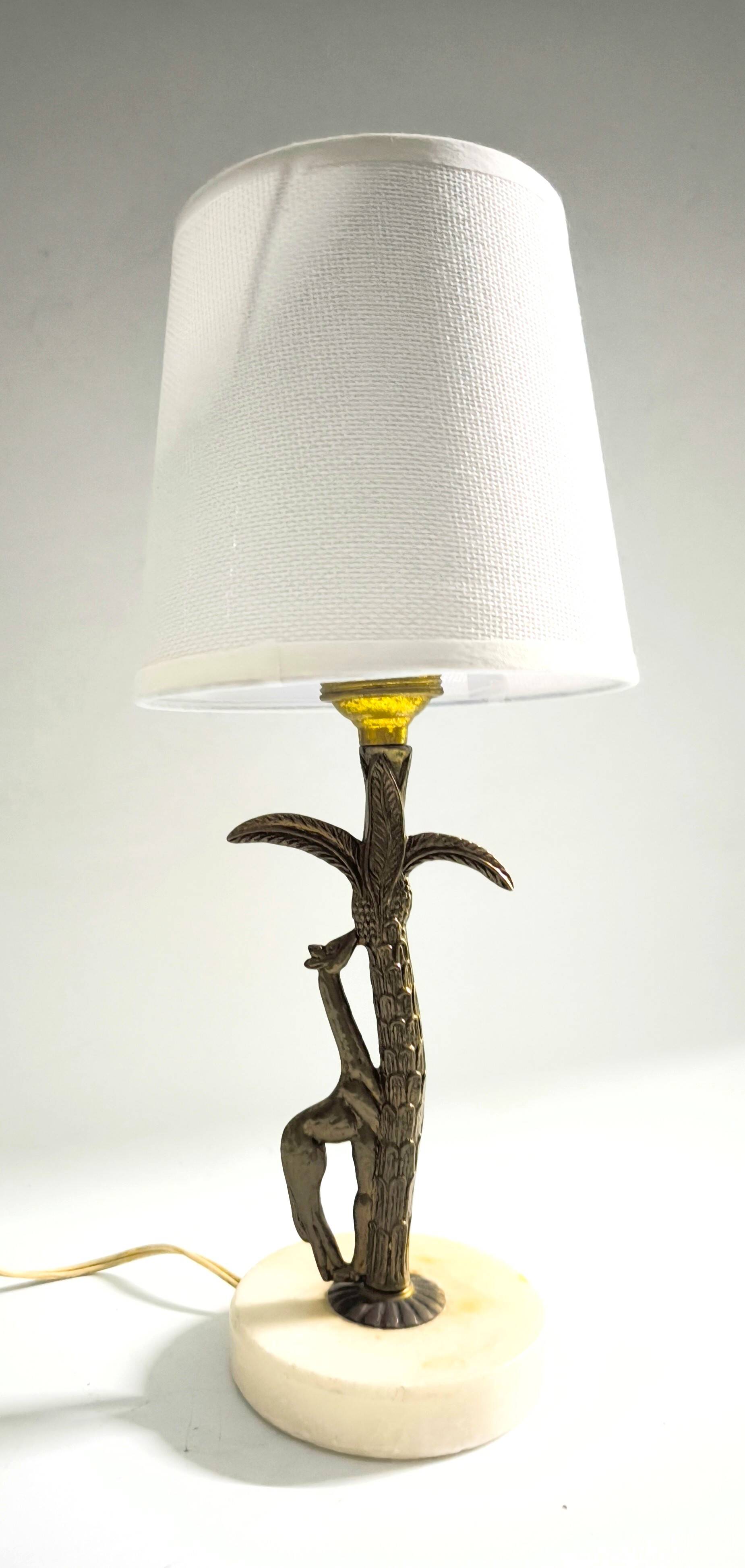 Bronze and marble lamp in Hollywood Regency style.