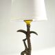 Bronze and marble lamp in Hollywood Regency style.