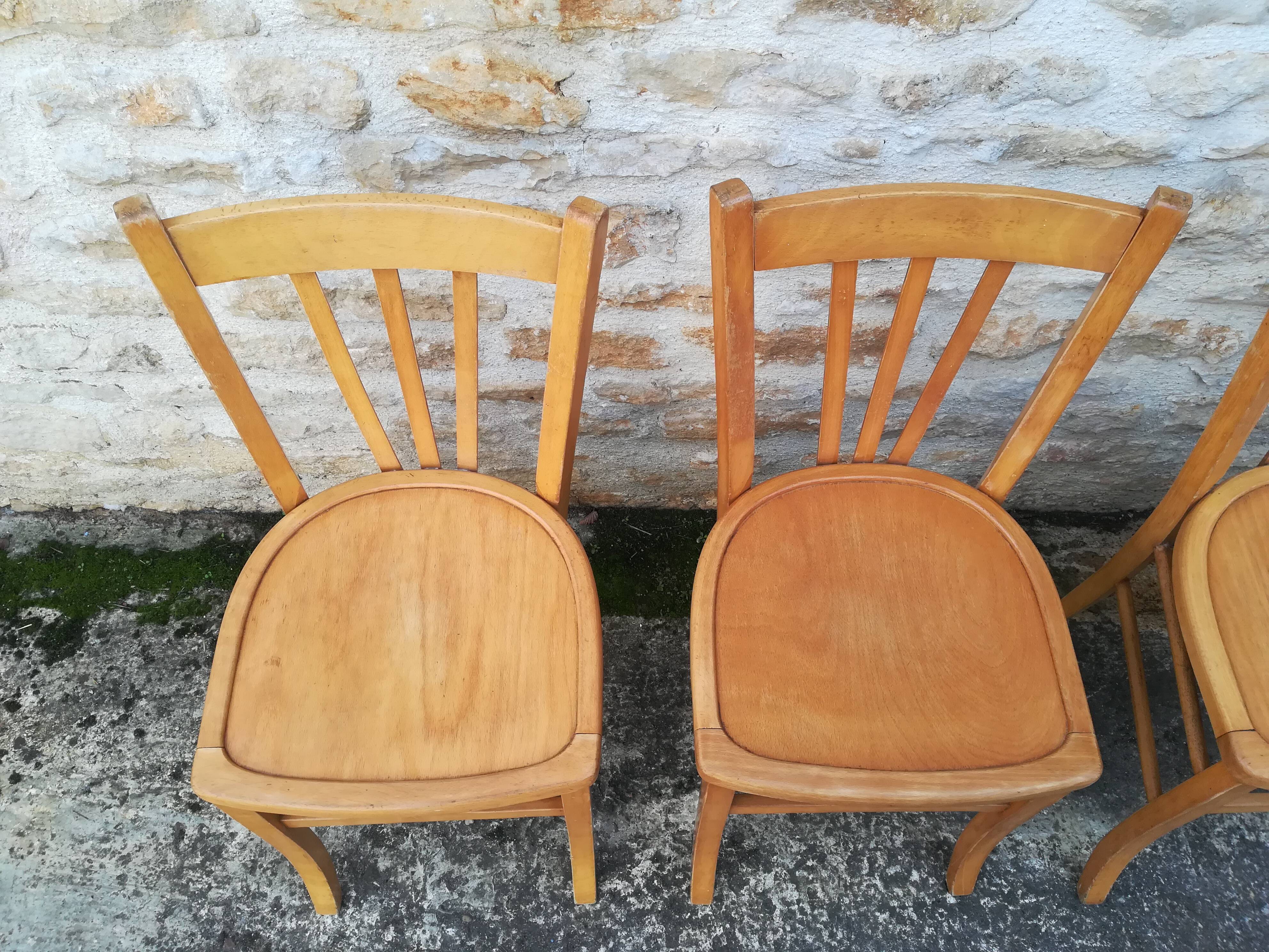 Set of 8 mismatched bistro chairs