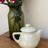 White ceramic teapot