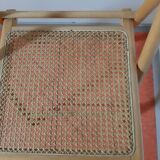 Folding chair in cannage