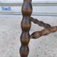 Turned wooden tripod stool