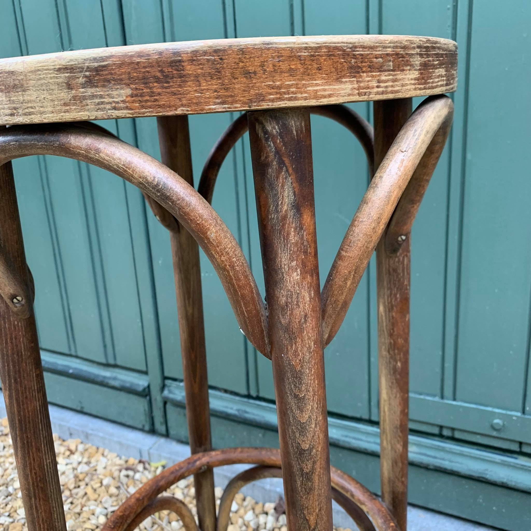 Curved wooden bistro stool