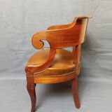Fauteuil de bureau garni de cuir début XIXe siècle,