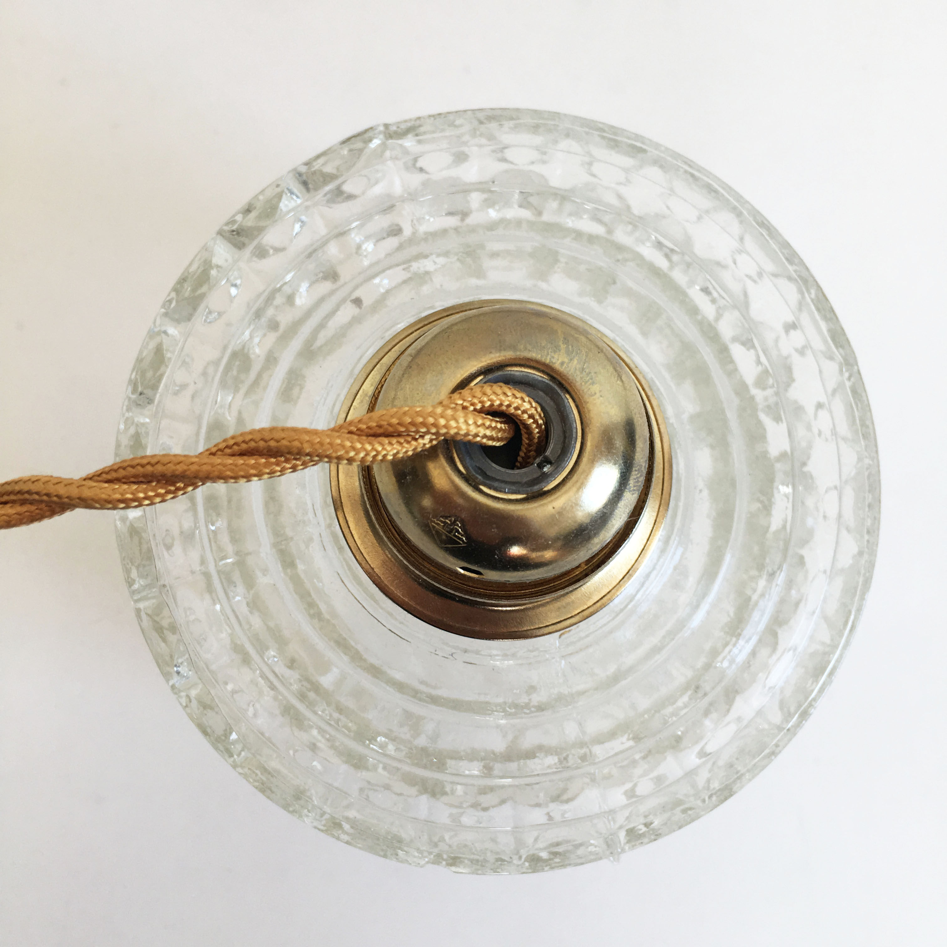 Suspension made with a vintage glass globe
