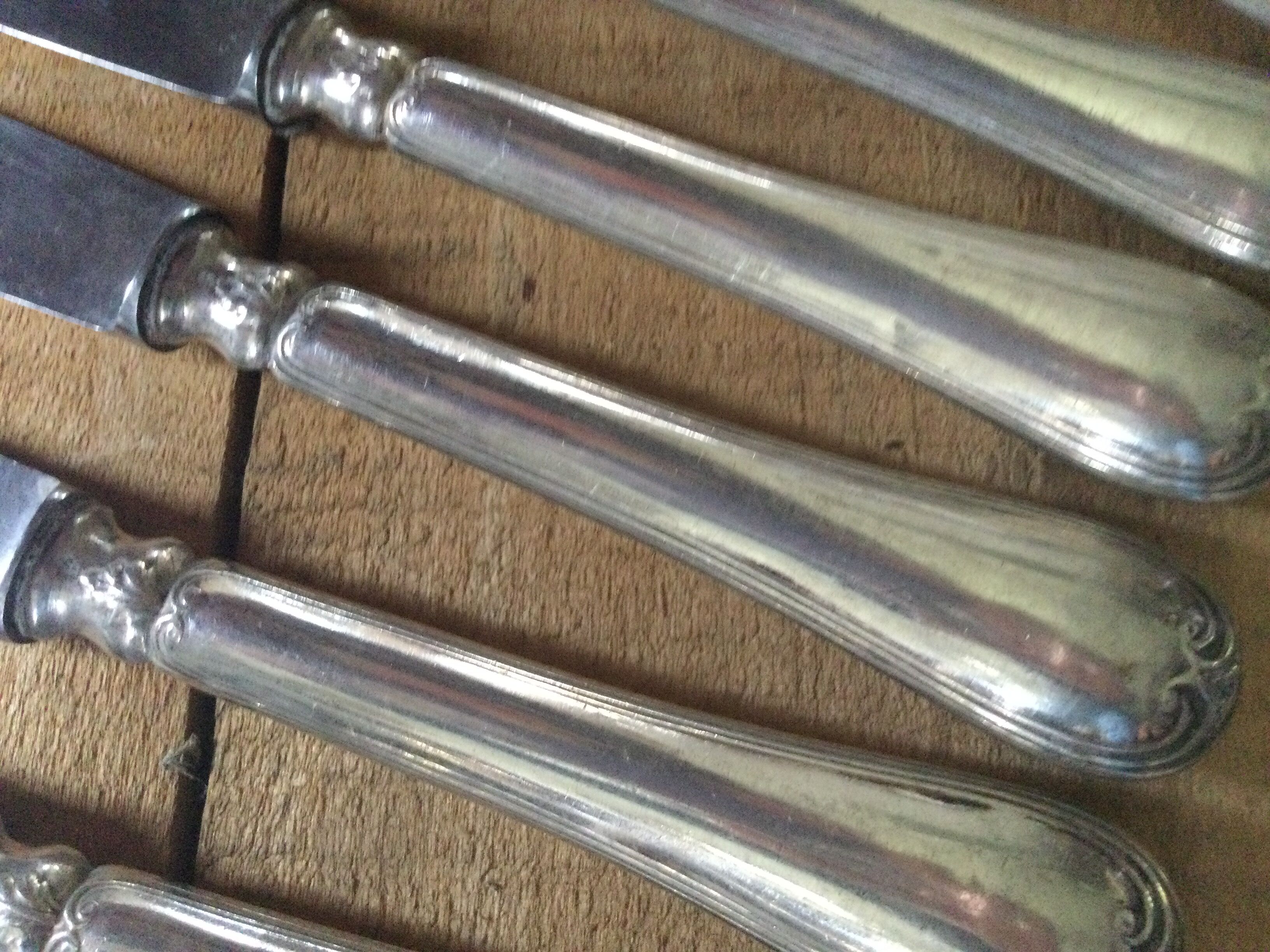 Set of 10 antique silver metal knives