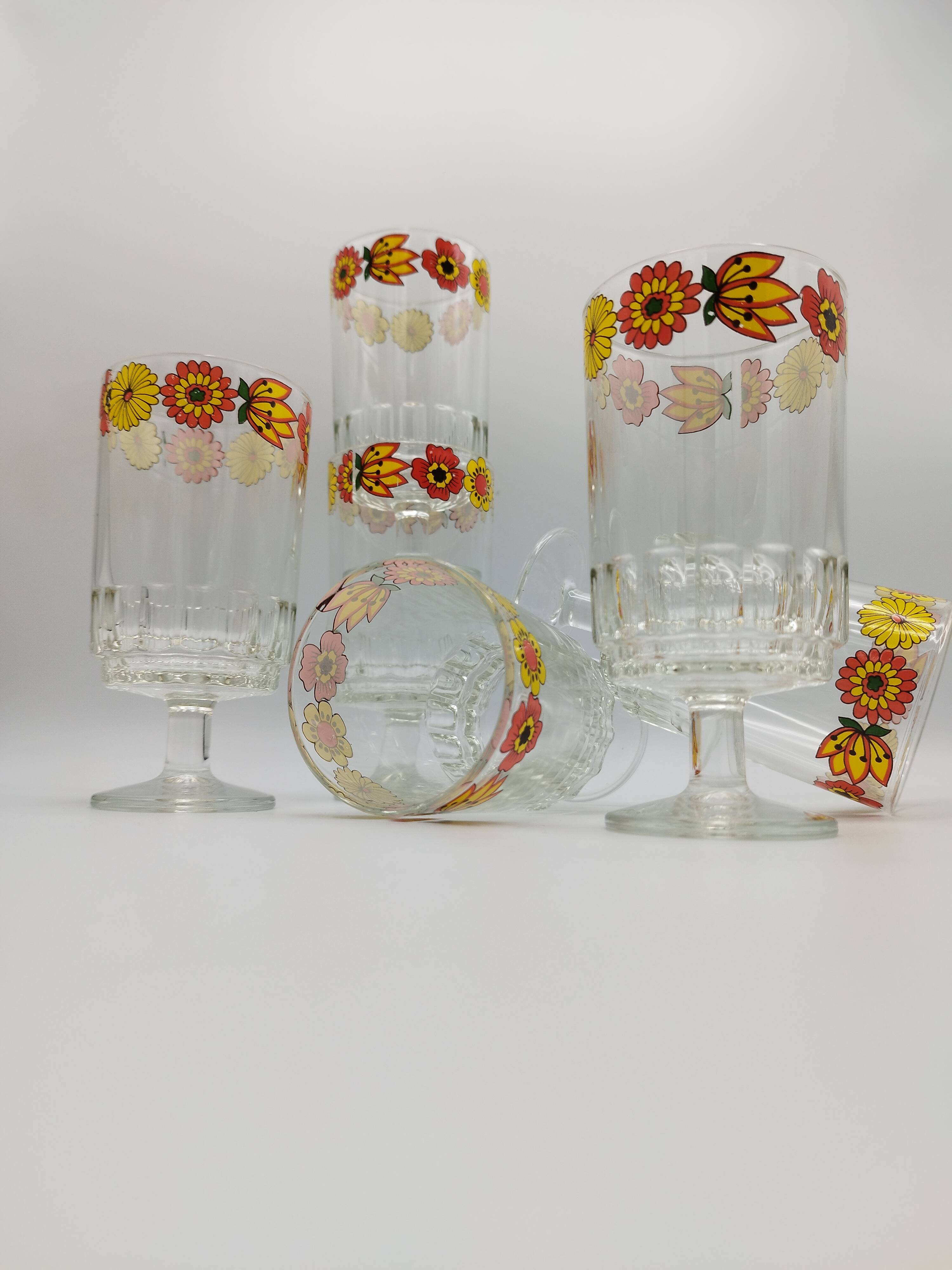 Vintage stemmed glass with floral decoration