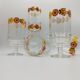 Vintage stemmed glass with floral decoration