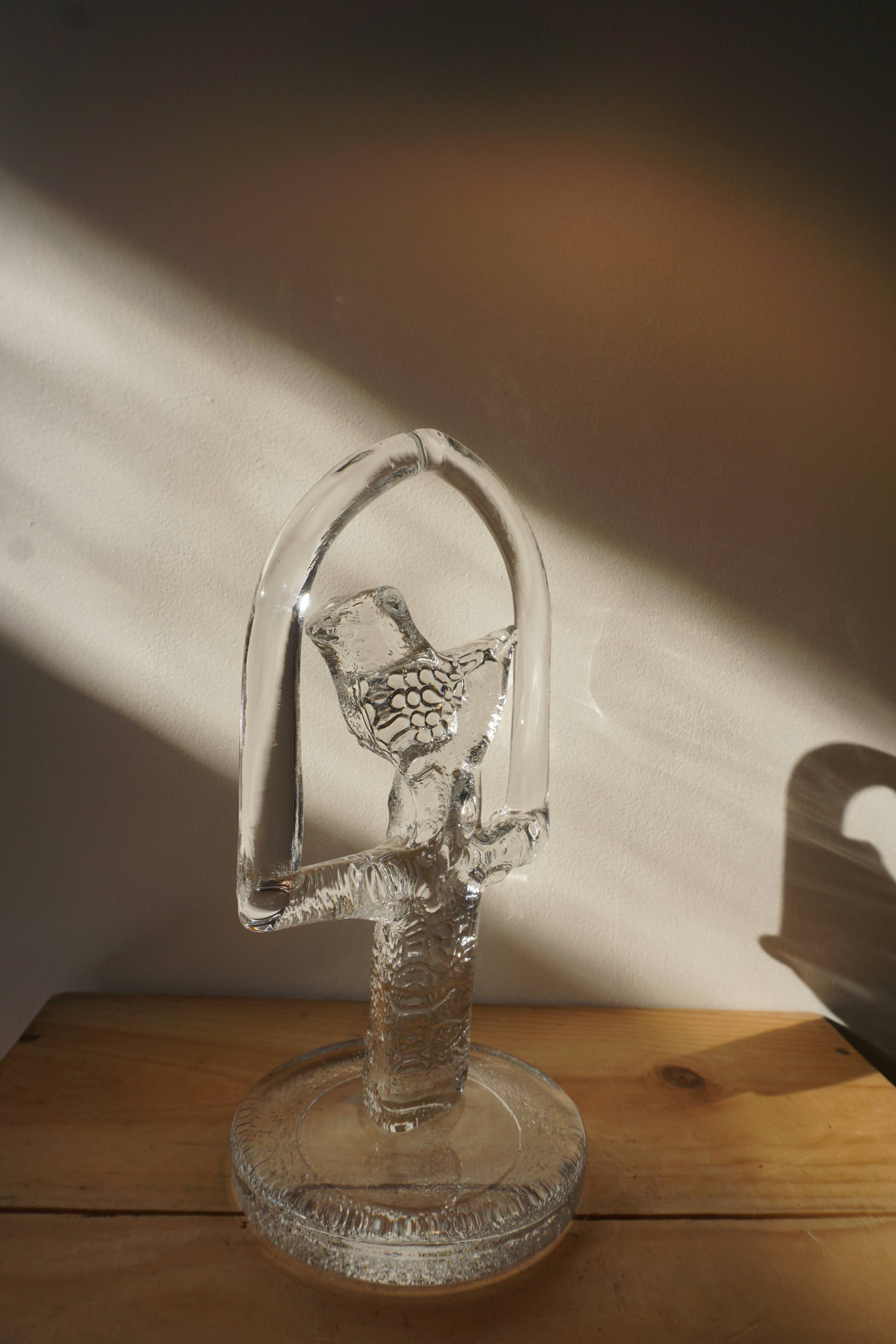 Glass bird suncatcher sculpture