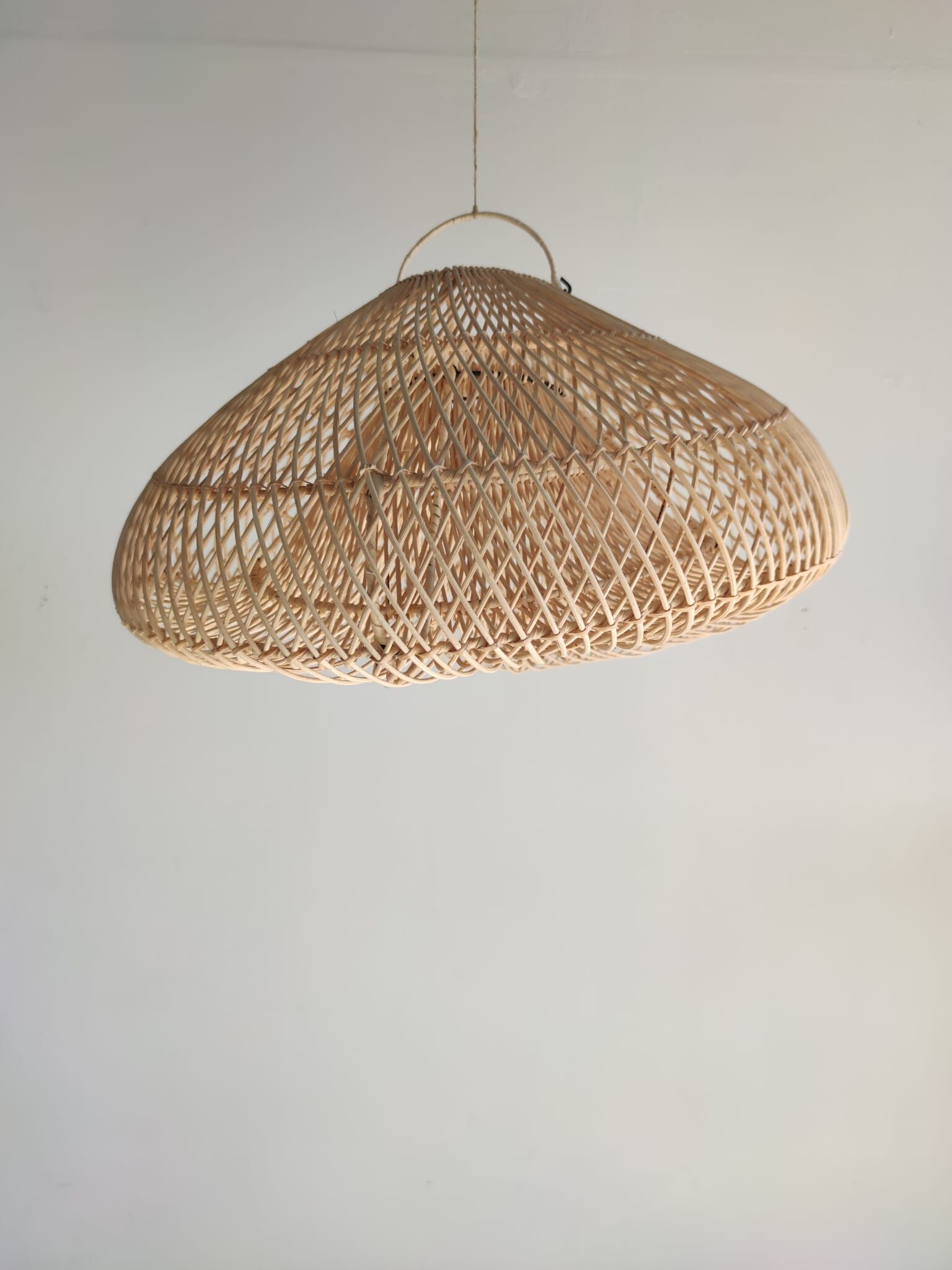 Small rattan lampshade in the shape of a braided hat