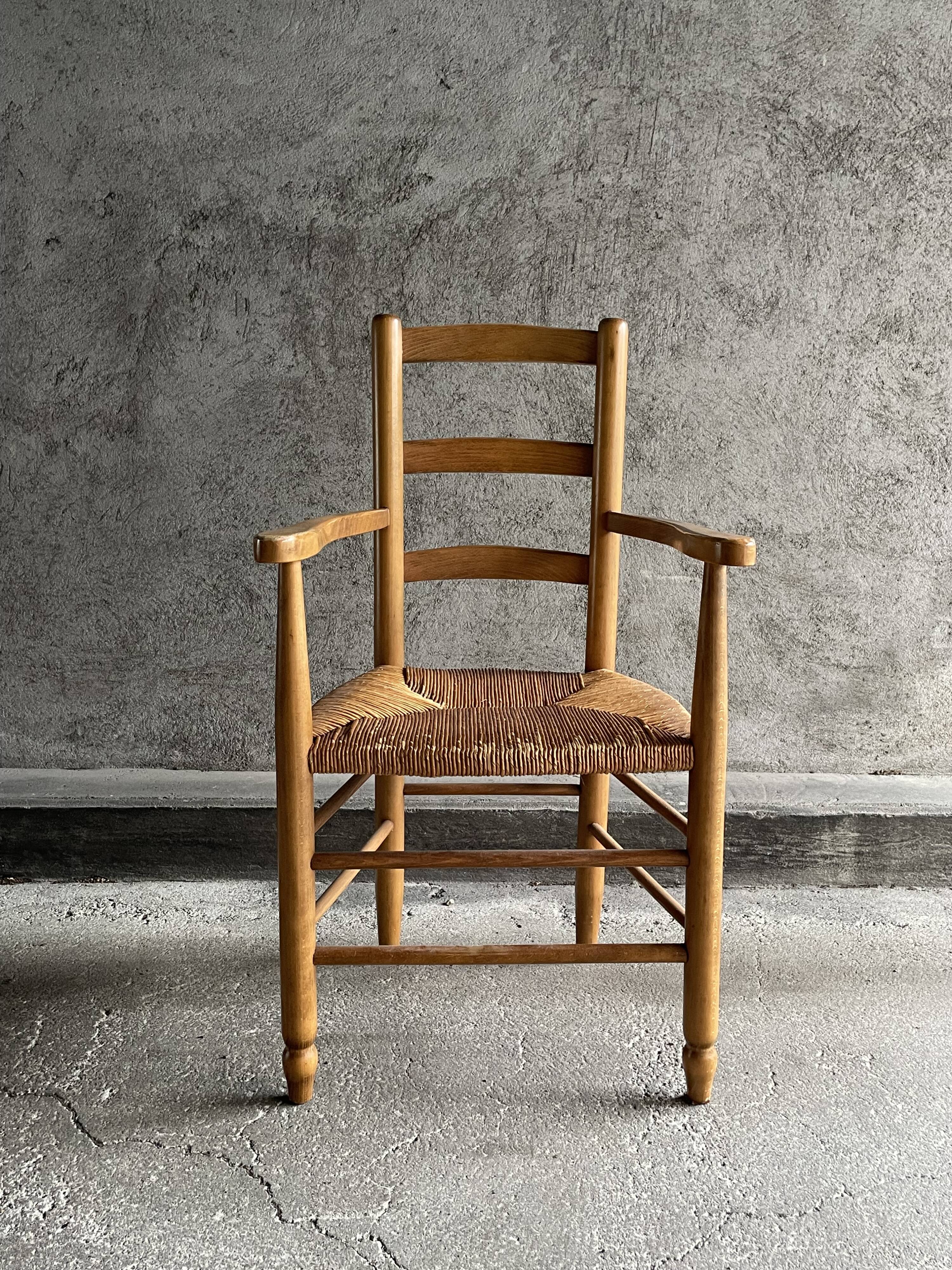 Straw chair with armrests, France