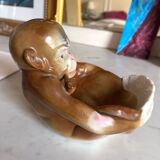 Pipe holder, ashtray or monkey pocket emptier