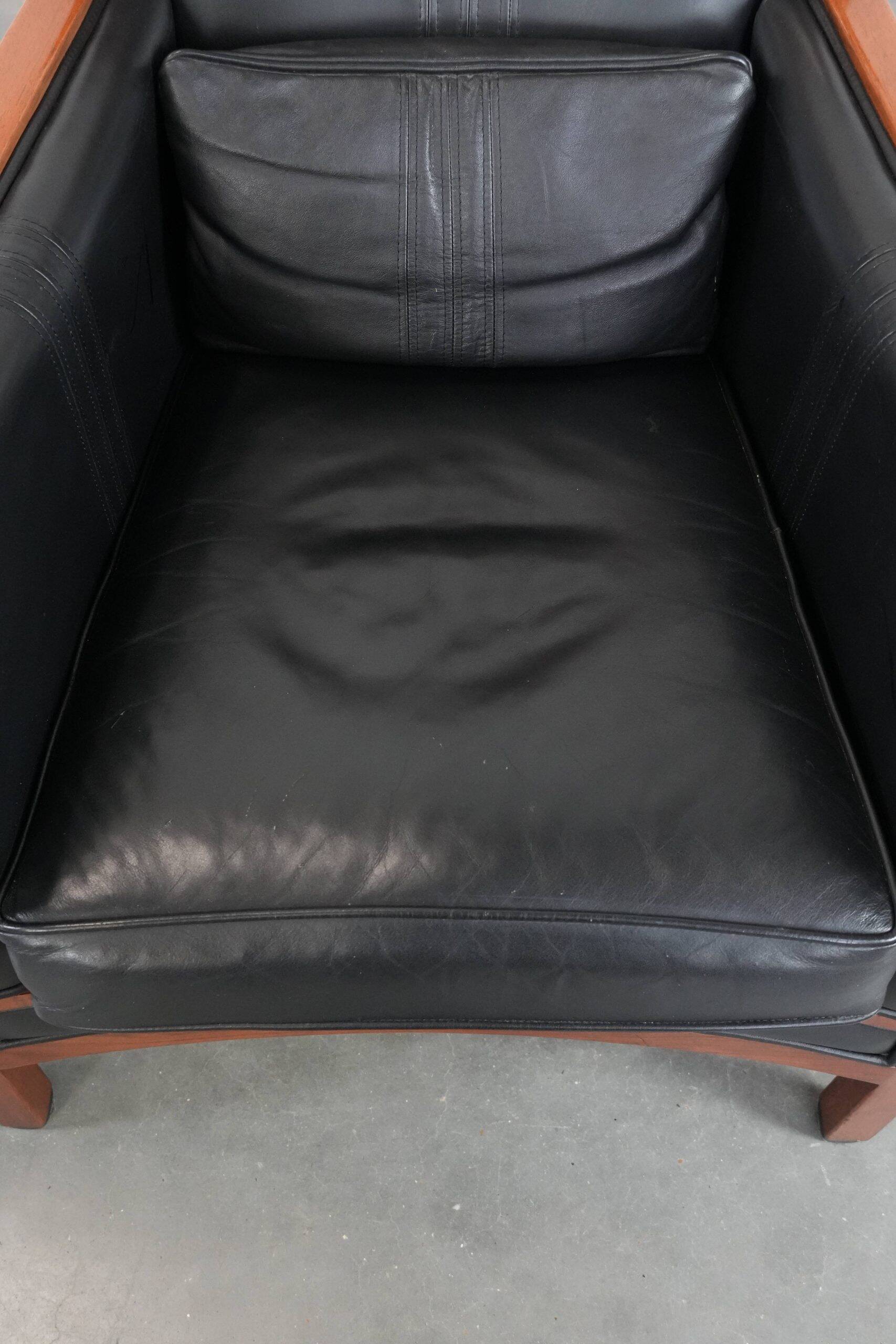 Set of  two black leather Art Deco design armchairs