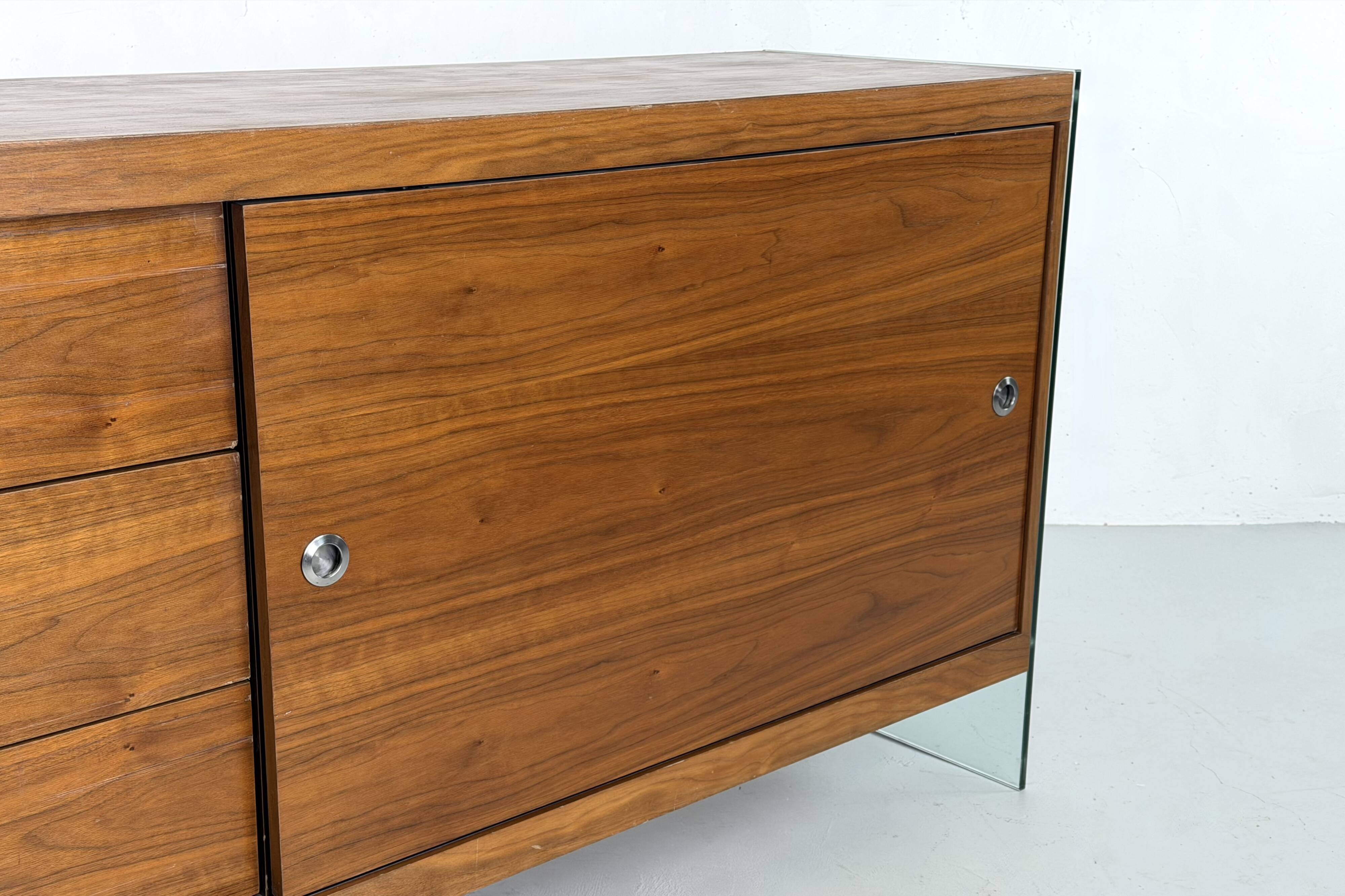 Teak sideboard with glass legs, France - 1990s