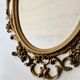 Baroque Style Oval Gold Mirror by Roberta Wood
