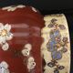 Vase - enamelled faïence with hand-painted gilding