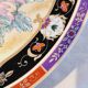 Vintage Japanese decorative plate with chrysanthemum and bird patterns.
